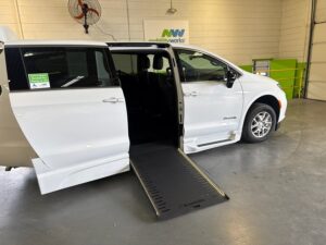 White Chrysler Pacifica with BraunAbility Side Entry Automatic In Floor conversion