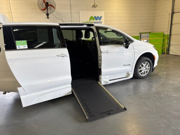 White Chrysler Pacifica with BraunAbility Side Entry Automatic In Floor conversion