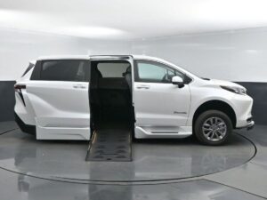 White Toyota Sienna with BraunAbility Side Entry Automatic Fold Out conversion