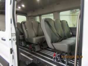 White Ford Transit with Driverge N/A N/A N/A conversion