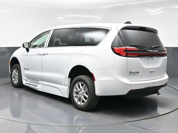 White Chrysler Pacifica with BraunAbility Side Entry Automatic Fold Out conversion
