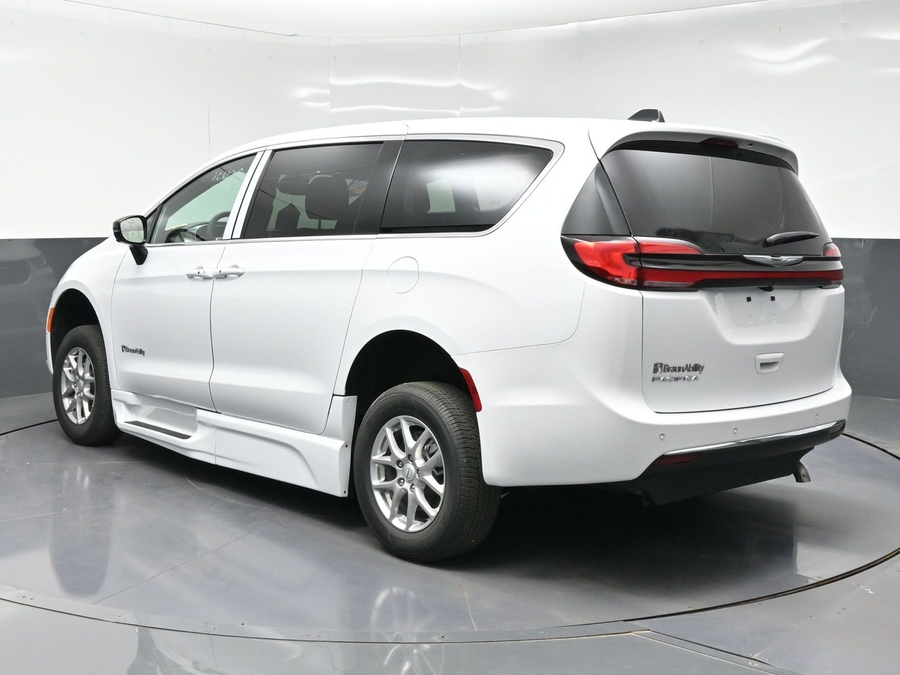 White Chrysler Pacifica with BraunAbility Side Entry Automatic Fold Out conversion