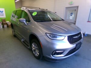 Silver Chrysler Pacifica with BraunAbility Side Entry Automatic In Floor conversion