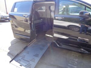 Black Toyota Sienna with BraunAbility Side Entry Automatic Fold Out conversion