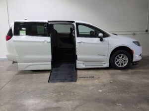 White Chrysler Voyager with BraunAbility Side Entry Automatic Fold Out conversion