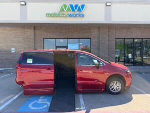 Red Chrysler Pacifica with BraunAbility Side Entry Automatic Fold Out conversion
