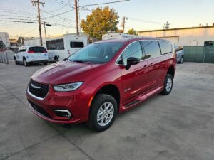 Red Chrysler Pacifica with Driverge Side Entry Automatic Fold Out conversion