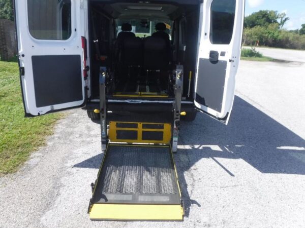 White Ram Promaster with Other Rear Entry Automatic Fold Out conversion