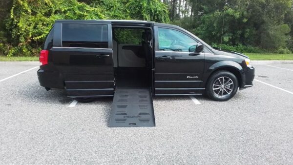 Black Dodge Grand Caravan with BraunAbility Side Entry Manual Fold Out conversion