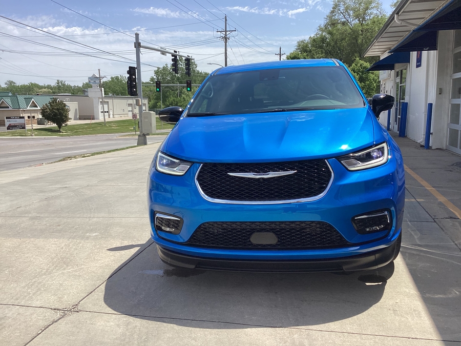 Blue Chrysler Pacifica with BraunAbility Side Entry Automatic In Floor conversion