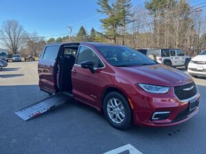 Red Chrysler Pacifica with Driverge Side Entry Automatic Fold Out conversion