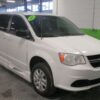 White Dodge Grand Caravan with BraunAbility Side Entry Manual Fold Out conversion