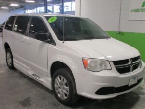 White Dodge Grand Caravan with BraunAbility Side Entry Manual Fold Out conversion