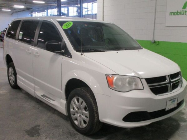 White Dodge Grand Caravan with BraunAbility Side Entry Manual Fold Out conversion