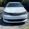 White Chrysler Voyager with Driverge Side Entry Automatic Fold Out conversion