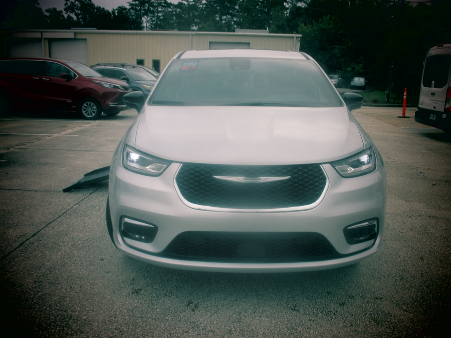 Silver Chrysler Pacifica with BraunAbility Side Entry Automatic Fold Out conversion