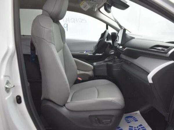 White Toyota Sienna with BraunAbility Side Entry Automatic Fold Out conversion