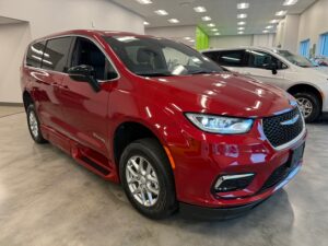 Red Chrysler Pacifica with BraunAbility Side Entry Automatic Fold Out conversion
