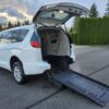 White Chrysler Pacifica with BraunAbility Rear Entry Manual Fold Out conversion