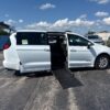 White Chrysler Voyager with Driverge Side Entry Automatic Fold Out conversion