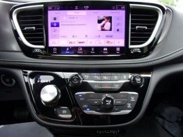 Grey Chrysler Pacifica with Driverge Side Entry Automatic Fold Out conversion