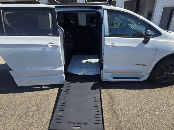 White Chrysler Pacifica with BraunAbility Side Entry Automatic In Floor conversion