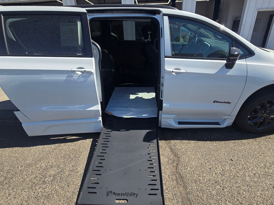 White Chrysler Pacifica with BraunAbility Side Entry Automatic In Floor conversion