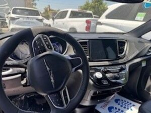 Black Chrysler Pacifica with BraunAbility Side Entry Automatic Fold Out conversion