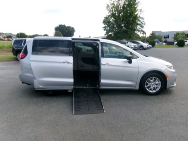 Silver Chrysler Pacifica with Driverge Side Entry Automatic Fold Out conversion