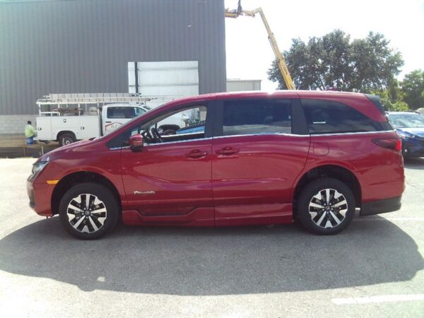 Red Honda Odyssey with BraunAbility Side Entry Automatic In Floor conversion