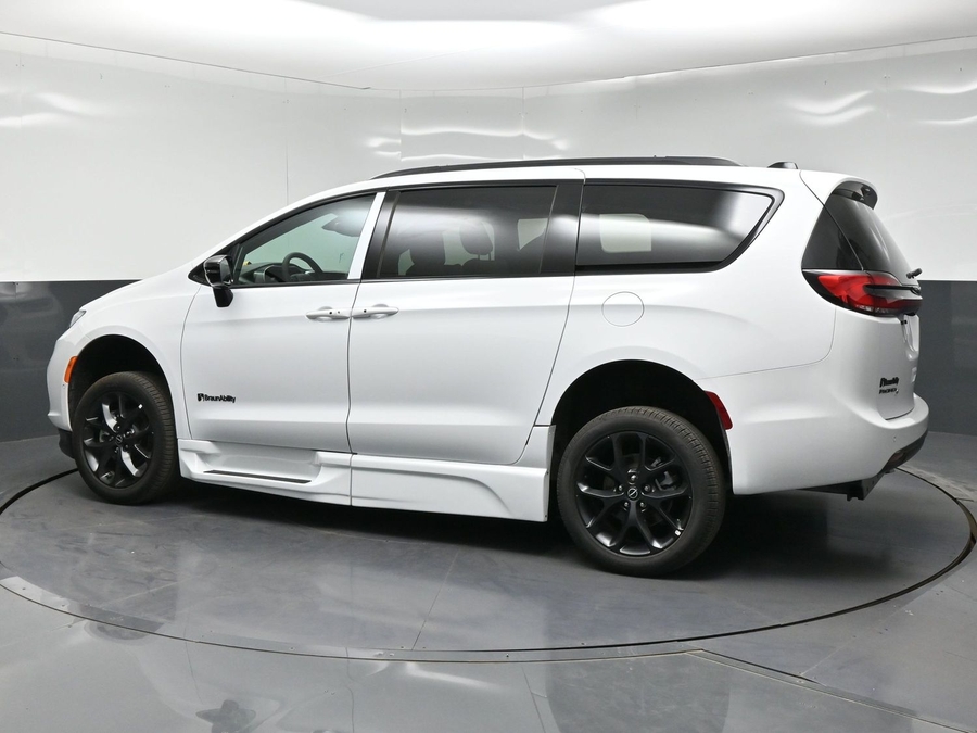 White Chrysler Pacifica with BraunAbility Side Entry Automatic Fold Out conversion