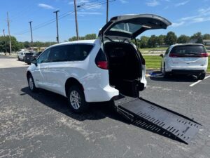 White Chrysler Voyager with BraunAbility Rear Entry Manual Fold Out conversion