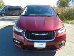 Red Chrysler Pacifica with BraunAbility Rear Entry Manual Fold Out conversion