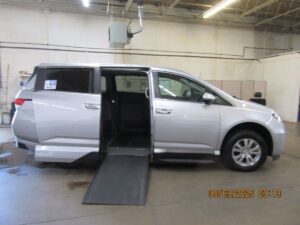 Silver Honda Odyssey with Vantage Mobility Side Entry Automatic In Floor conversion
