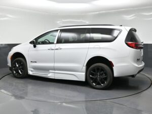 White Chrysler Pacifica with BraunAbility Side Entry Automatic Fold Out conversion