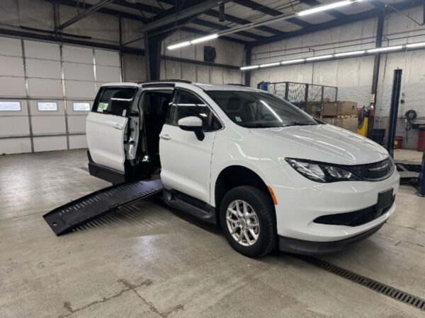 White Chrysler Voyager with BraunAbility Side Entry Manual Fold Out conversion