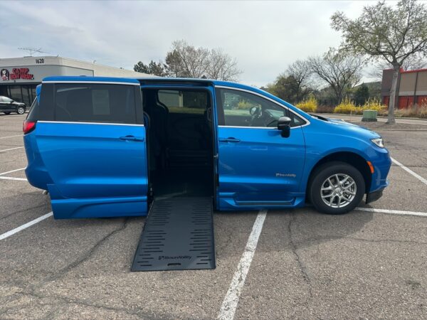 Blue Chrysler Pacifica with BraunAbility Side Entry Automatic Fold Out conversion