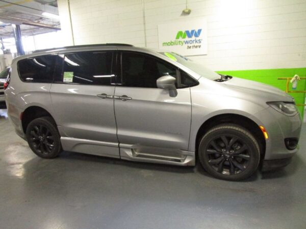 Silver Chrysler Pacifica with BraunAbility Side Entry Automatic In Floor conversion