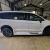 White Chrysler Pacifica with Driverge Rear Entry Manual Fold Out conversion