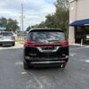 Black Chrysler Pacifica with BraunAbility Side Entry Automatic Fold Out conversion