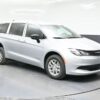 Silver Chrysler Voyager with BraunAbility Rear Entry Manual Fold Out conversion