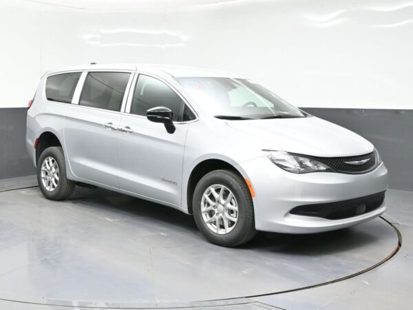 Silver Chrysler Voyager with BraunAbility Rear Entry Manual Fold Out conversion