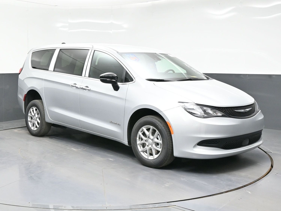 Silver Chrysler Voyager with BraunAbility Rear Entry Manual Fold Out conversion