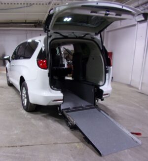 White Chrysler Voyager with Driverge Rear Entry Manual Fold Out conversion