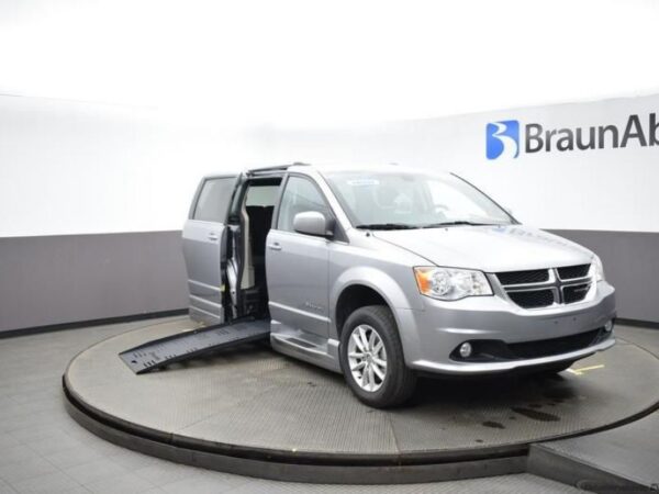 Silver Dodge Grand Caravan with BraunAbility Side Entry Automatic Fold Out conversion