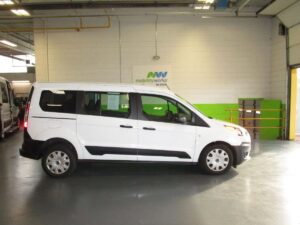 White Ford Transit Connect with Driverge Rear Entry Manual Fold Out conversion