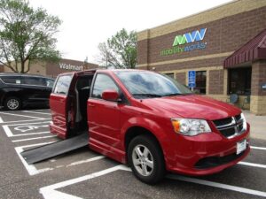Red Dodge Grand Caravan with Vantage Mobility Side Entry Automatic In Floor conversion