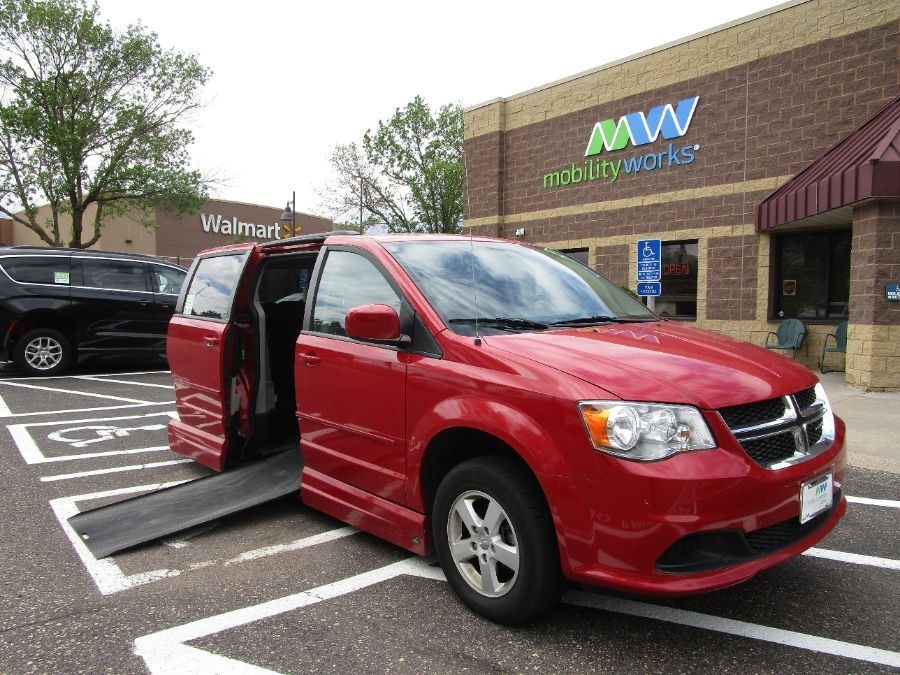 Red Dodge Grand Caravan with Vantage Mobility Side Entry Automatic In Floor conversion