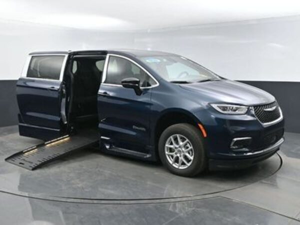 Blue Chrysler Pacifica with BraunAbility Side Entry Automatic Fold Out conversion