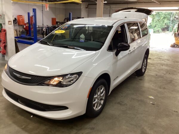 White Chrysler Voyager with BraunAbility Rear Entry Manual Fold Out conversion